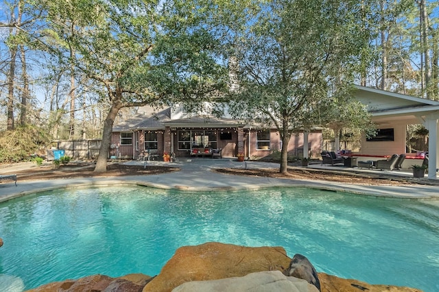 view of pool with a patio