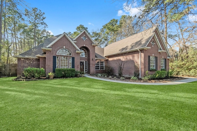 front facade with a front lawn