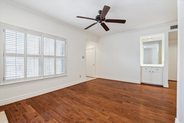 unfurnished room with hardwood / wood-style flooring, crown molding, and ceiling fan