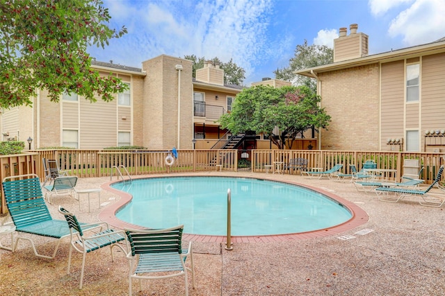 view of pool with a patio