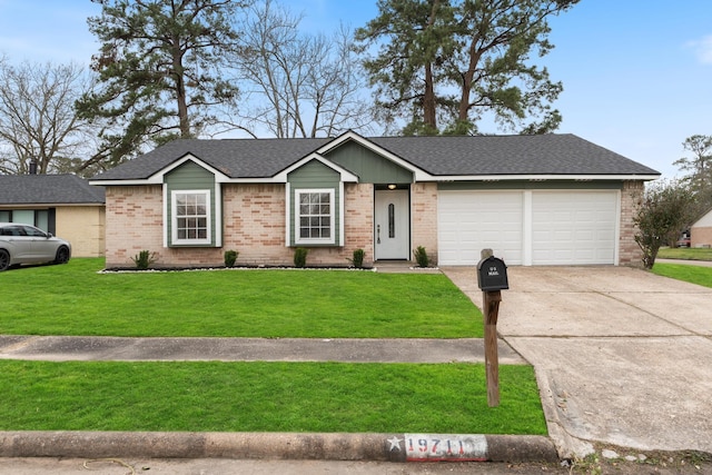 ranch-style home featuring an attached garage, driveway, a shingled roof, and a front yard