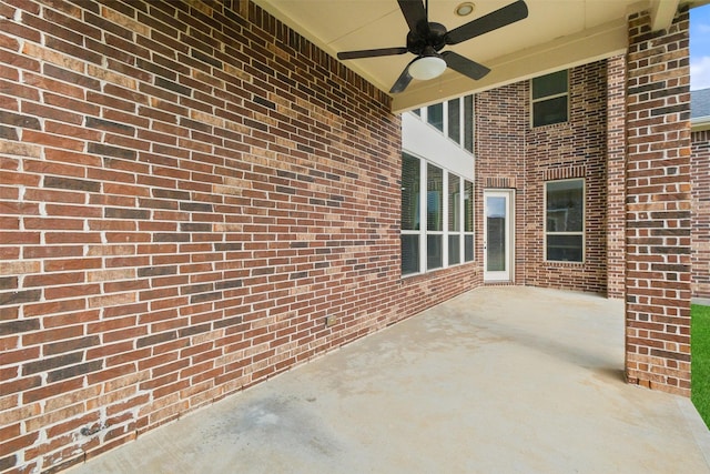 view of patio / terrace featuring ceiling fan