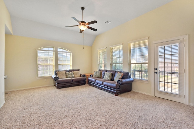 living room featuring carpet flooring and plenty of natural light