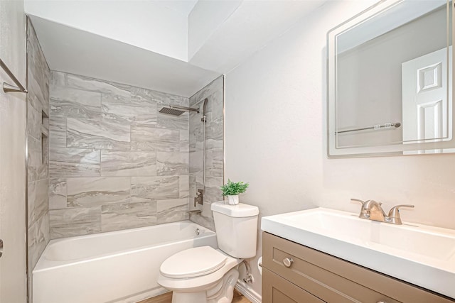 full bathroom featuring bathtub / shower combination, vanity, and toilet