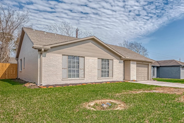 ranch-style home with concrete driveway, an attached garage, fence, a front lawn, and brick siding