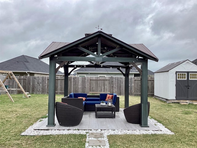 view of patio / terrace with a storage unit, an outdoor living space, a gazebo, and a playground