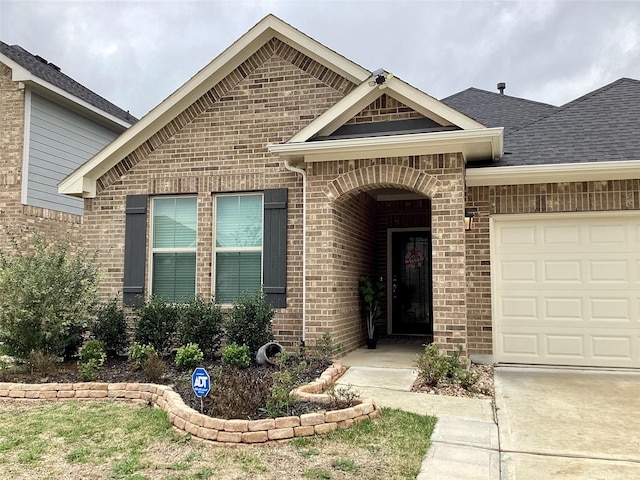 view of front of home featuring a garage