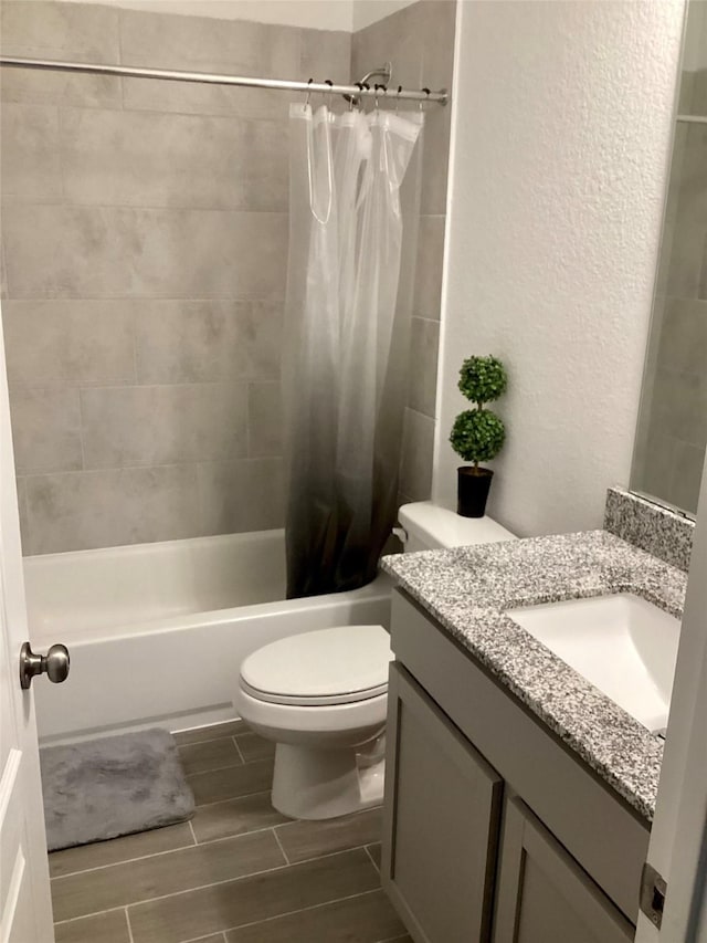 full bathroom with vanity, toilet, and shower / bathtub combination with curtain