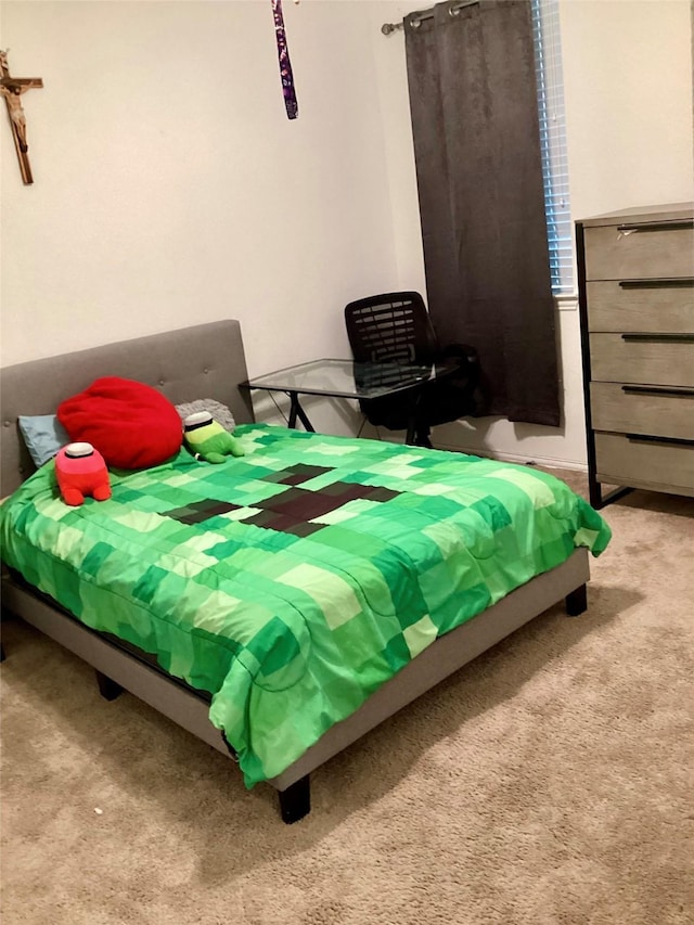 bedroom featuring light colored carpet