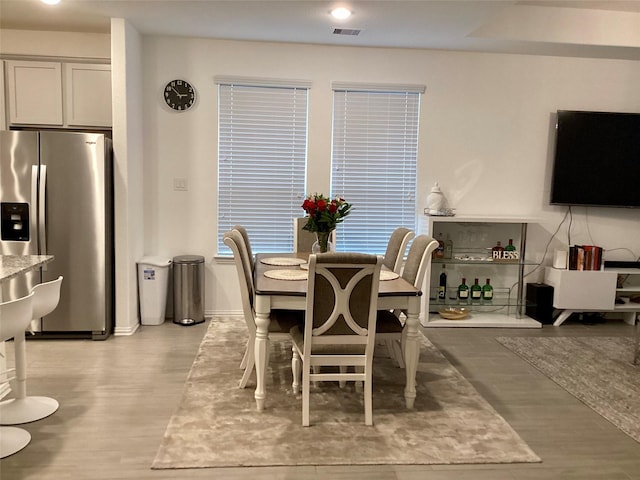 dining area featuring light hardwood / wood-style flooring