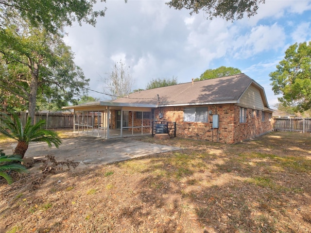 back of house featuring a patio area