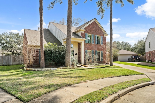 front facade featuring a front lawn and a garage