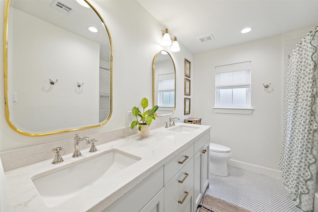 bathroom featuring vanity, a shower with curtain, tile patterned flooring, and toilet