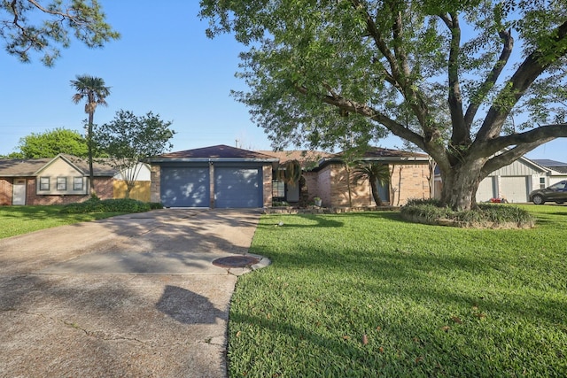 ranch-style house with an attached garage, driveway, and a front lawn