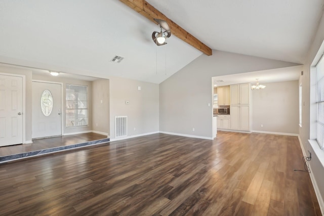 unfurnished living room featuring a notable chandelier, visible vents, vaulted ceiling with beams, and wood finished floors