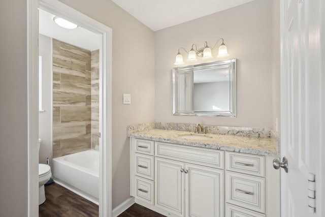 full bathroom featuring vanity, toilet, and wood finished floors