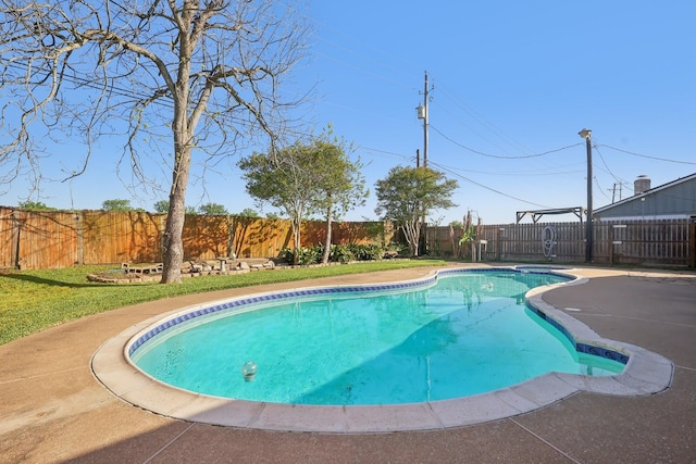 view of pool with a fenced in pool, a yard, and a fenced backyard