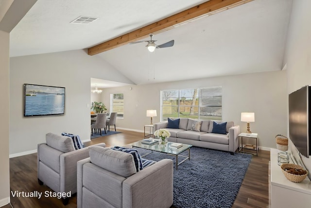 living area featuring dark wood-style flooring, baseboards, vaulted ceiling with beams, and visible vents