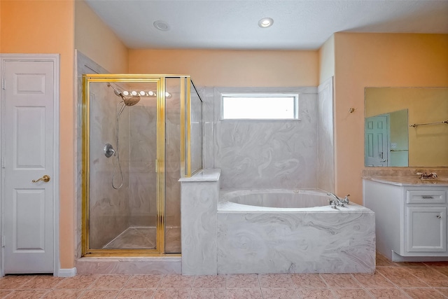 bathroom featuring vanity, tile patterned flooring, and independent shower and bath