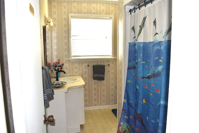 bathroom with vanity and walk in shower