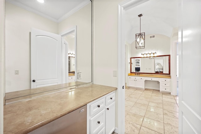 bathroom featuring visible vents, vanity, and crown molding