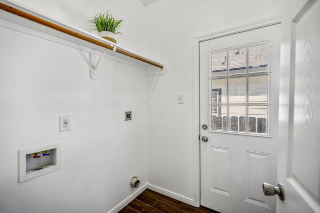 laundry area with dark hardwood / wood-style floors, washer hookup, and electric dryer hookup