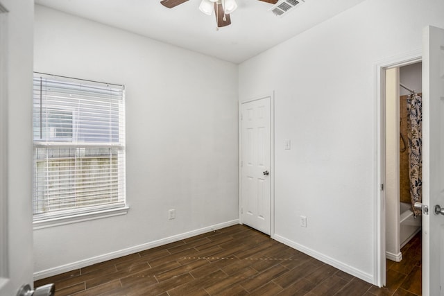 unfurnished room with ceiling fan