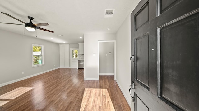 empty room featuring hardwood / wood-style flooring and ceiling fan