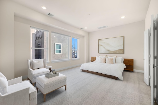 bedroom with carpet, visible vents, baseboards, and recessed lighting