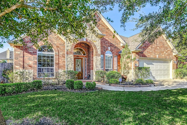 traditional home featuring a garage, driveway, brick siding, and a front lawn