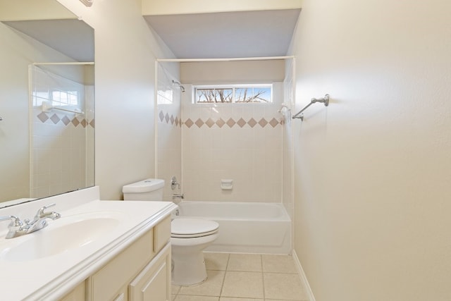 bathroom with shower / bathing tub combination, toilet, vanity, tile patterned flooring, and baseboards