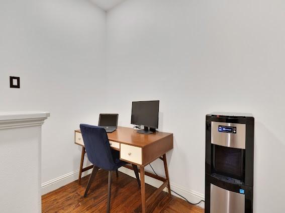 home office featuring hardwood / wood-style flooring