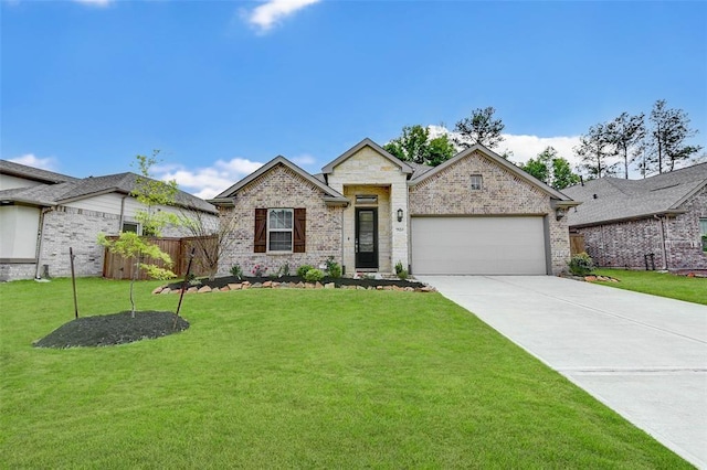 view of front of home featuring an attached garage, driveway, brick siding, and a front yard