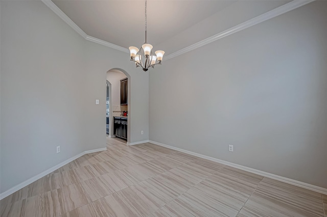 unfurnished living room featuring crown molding and an inviting chandelier