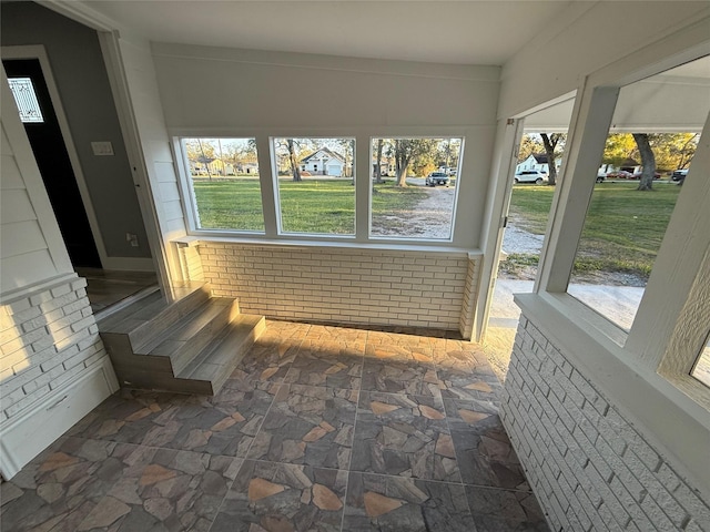 view of unfurnished sunroom