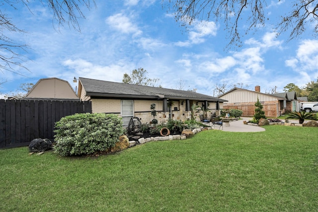 exterior space with a patio and fence