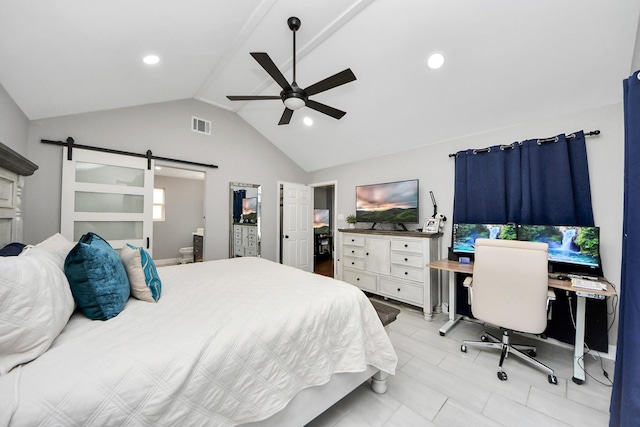 bedroom with lofted ceiling, visible vents, ensuite bathroom, a ceiling fan, and a barn door