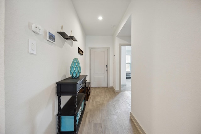 hallway featuring light wood-type flooring