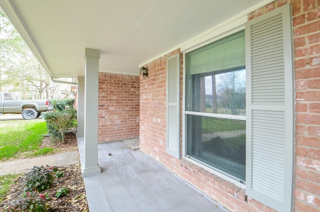 view of patio featuring a porch