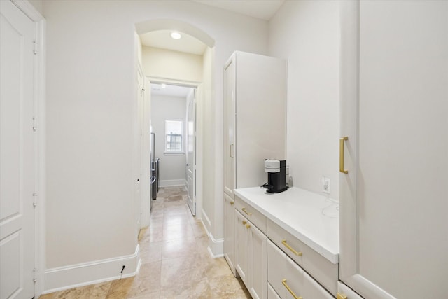 bathroom featuring baseboards and tile patterned floors