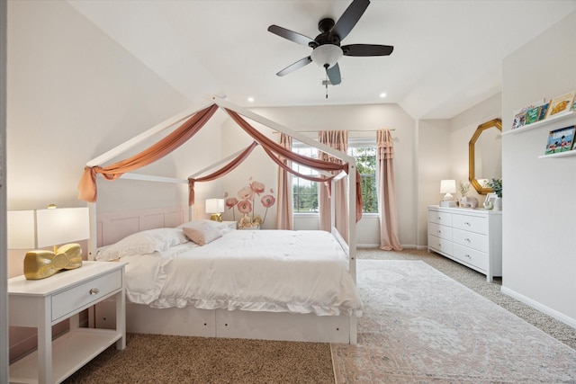 bedroom with lofted ceiling, light carpet, ceiling fan, and baseboards