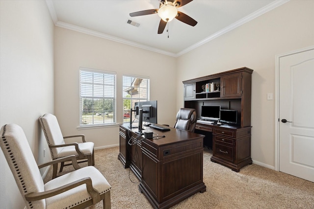 office space with baseboards, crown molding, visible vents, and light colored carpet