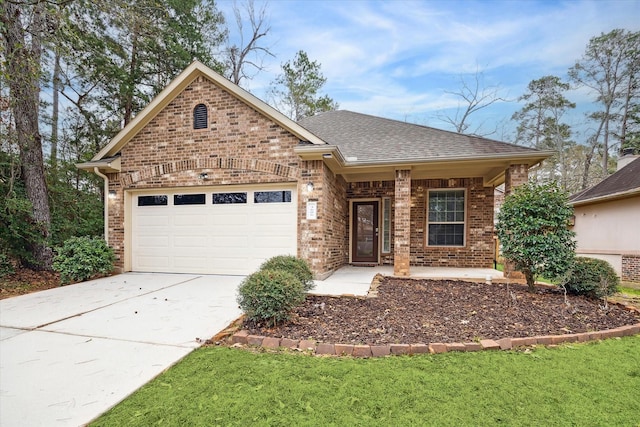 view of front of property with a garage, a shingled roof, concrete driveway, covered porch, and brick siding