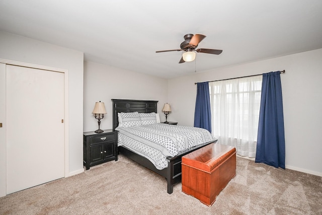1133 Peebles St, Hempstead, TX 77445 - bedroom featuring light colored carpet, baseboards, and a ceiling fan