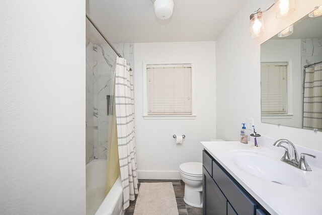 full bathroom with shower / bathtub combination with curtain, toilet, vanity, wood finished floors, and baseboards