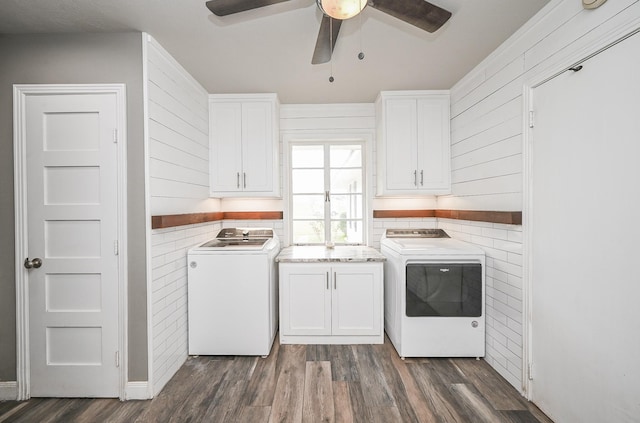 1133 Peebles St, Hempstead, TX 77445 - laundry room with cabinet space, a ceiling fan, dark wood-style floors, and washer and dryer