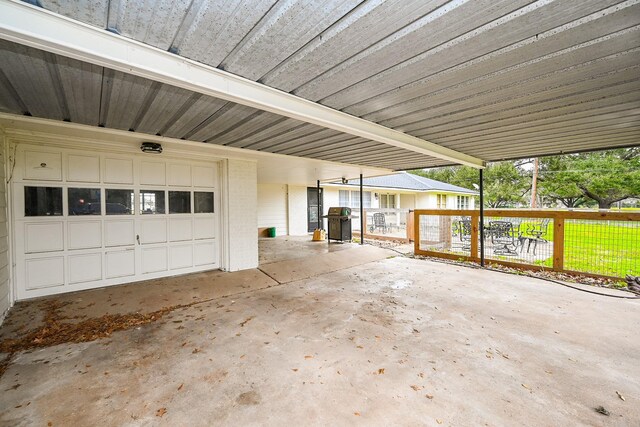 garage featuring fence