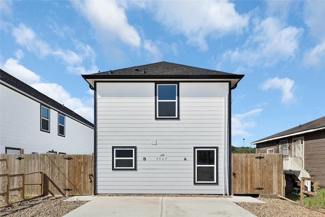 rear view of property with a patio area