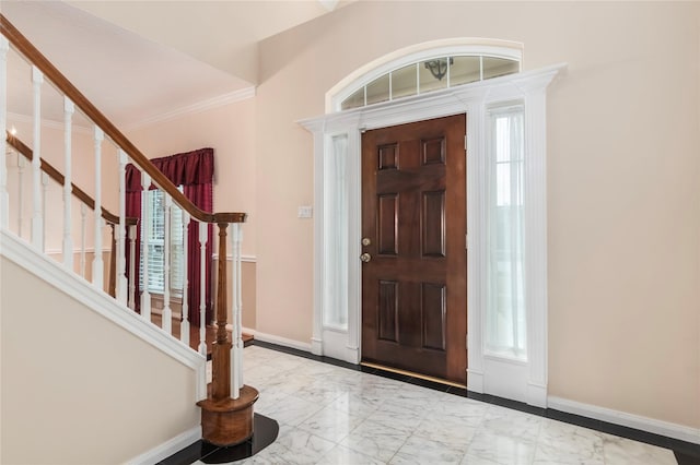 entrance foyer with ornamental molding