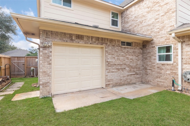 garage with a yard